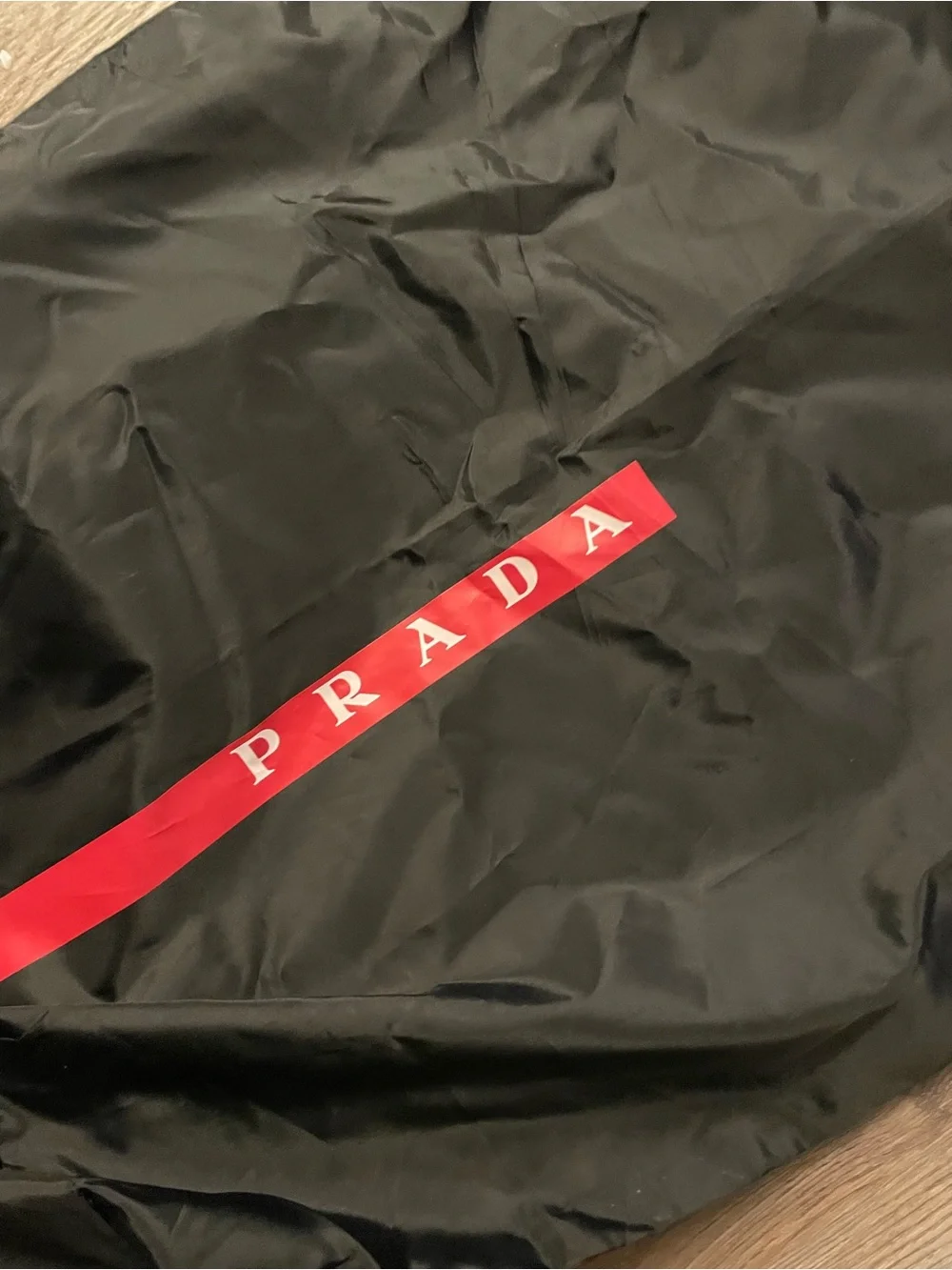 Prada Black Nylon Duffel with Vertical Red Logo Stripe